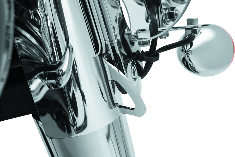 Chrome Kuryakyn tie down bracket for 2014-2022 Indian motorcycles, shown mounted on the bike for secure cargo attachment.