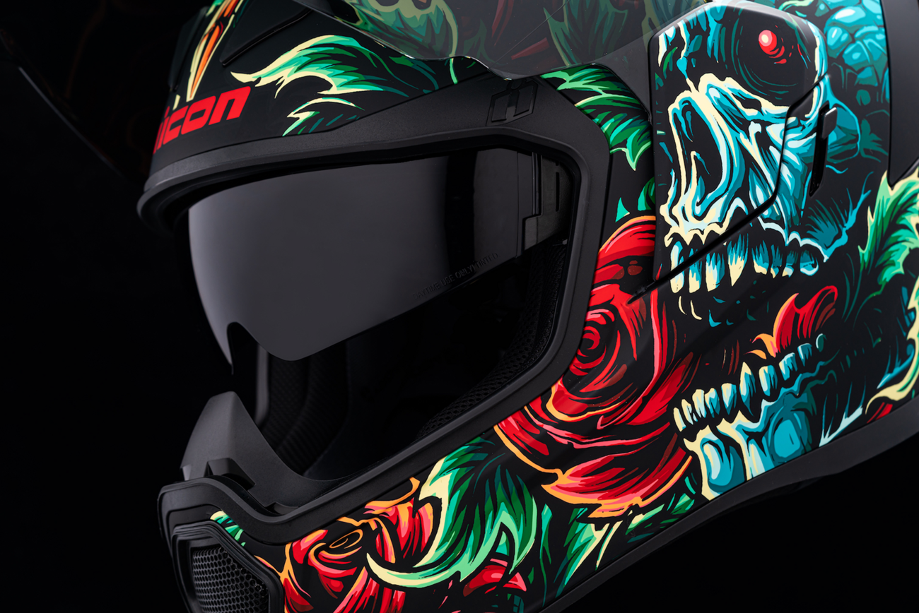 Black ICON Airflite™ helmet with Omnicrux MIPS® technology, large size, shown from side view with sleek aerodynamic design.