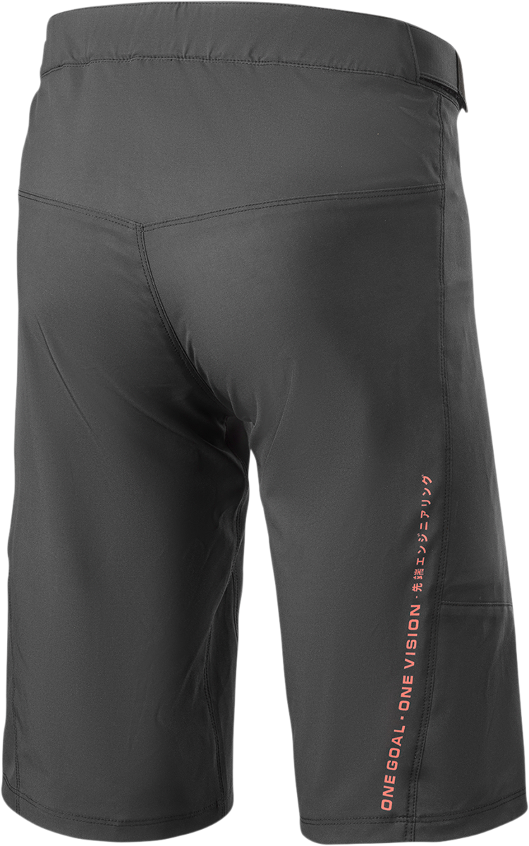 Alpinestars Alps 6.0 Shorts in black and coral, US size 34, showing the sporty design and logo on the black fabric.