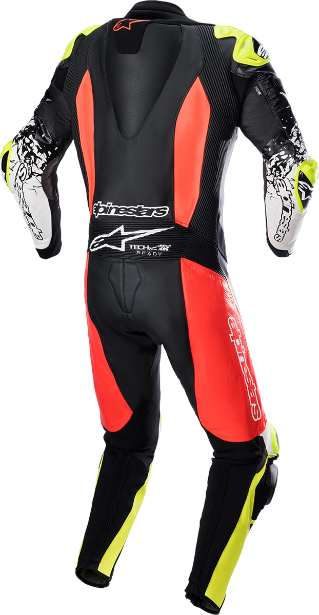 Alpinestars GP Tech v4 leather motorcycle suit in black, red, and yellow fluo with protective padding and sleek racing design.
