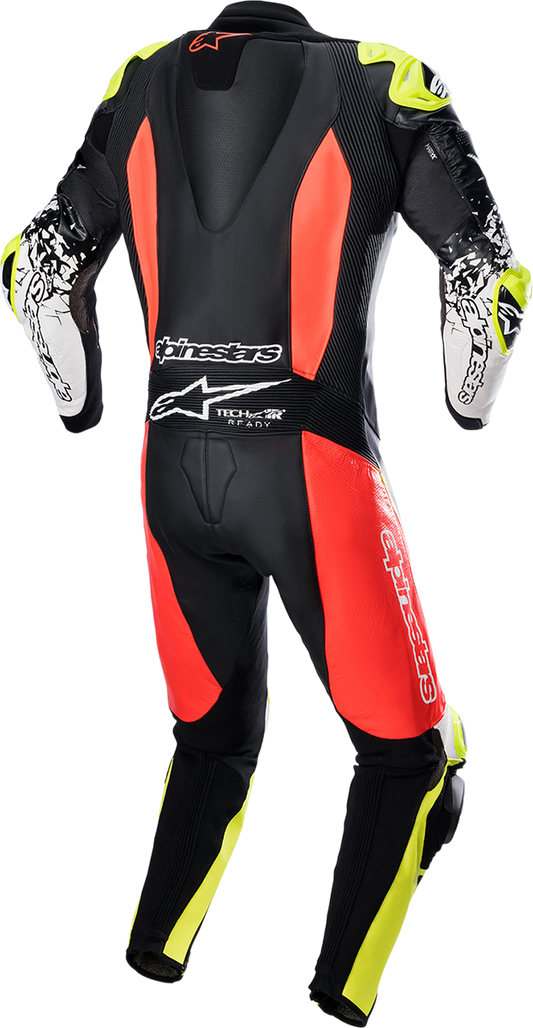 Alpinestars GP Tech v4 leather motorcycle suit in black, red, and yellow fluo with protective padding and sleek racing design.