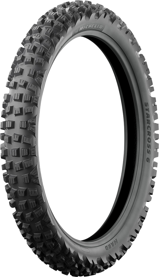 Michelin StarCross 6 Hard front tire 90/100-21 for motocross bikes, featuring rugged tread for off-road riding.
