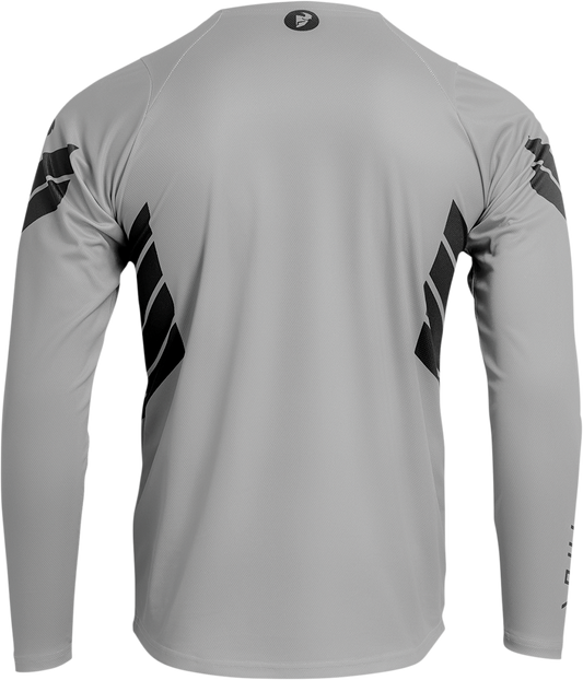 Gray THOR Assist Sting long-sleeve MTB jersey with logo, designed for mountain biking comfort and protection.