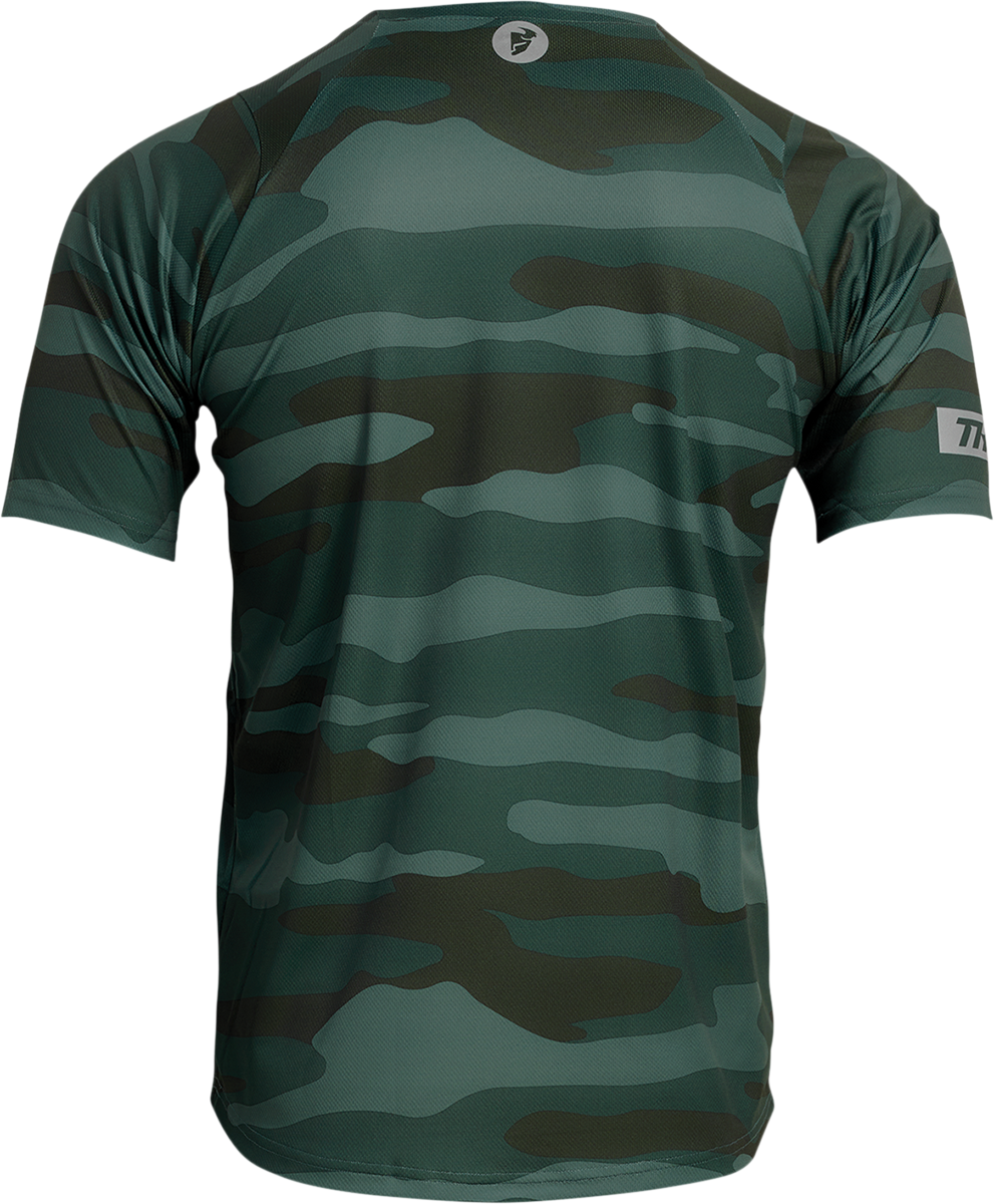 THOR Assist short-sleeve jersey in camo green, model 5020-0023, XL, featuring breathable fabric and motocross-inspired design.