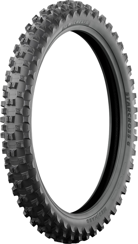 MICHELIN StarCross 6 medium soft front motorcycle tire 90/100-21 for off-road riding, showing tread pattern and sidewall details.