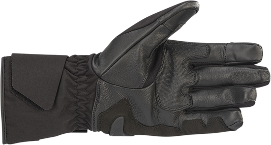 Black Alpinestars Apex V2 Drystar® motorcycle gloves in size XL, showing the textured knuckles and secure wrist strap.