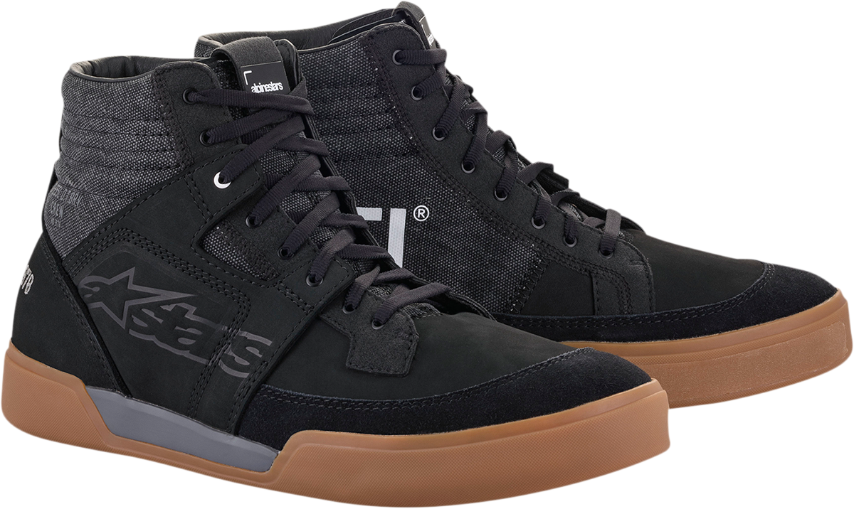Alpinestars Akio black shoes for men, US size 8, shown in a close-up view highlighting sleek design and sporty style.
