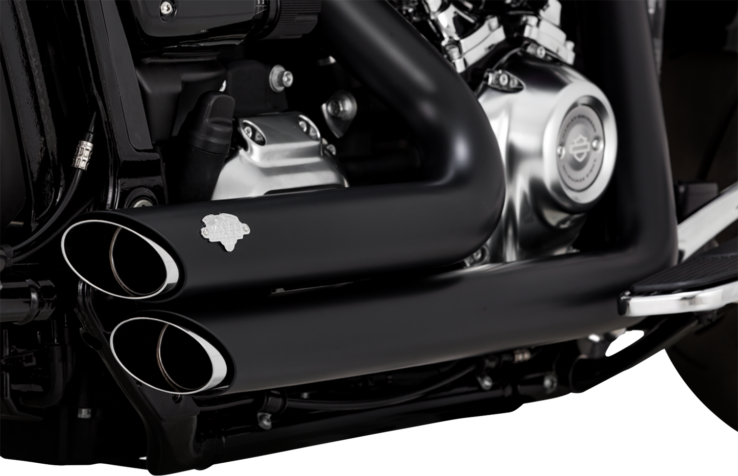 VANCE & HINES Shortshots Staggered Exhaust System in matte black with PCX technology on motorcycle.