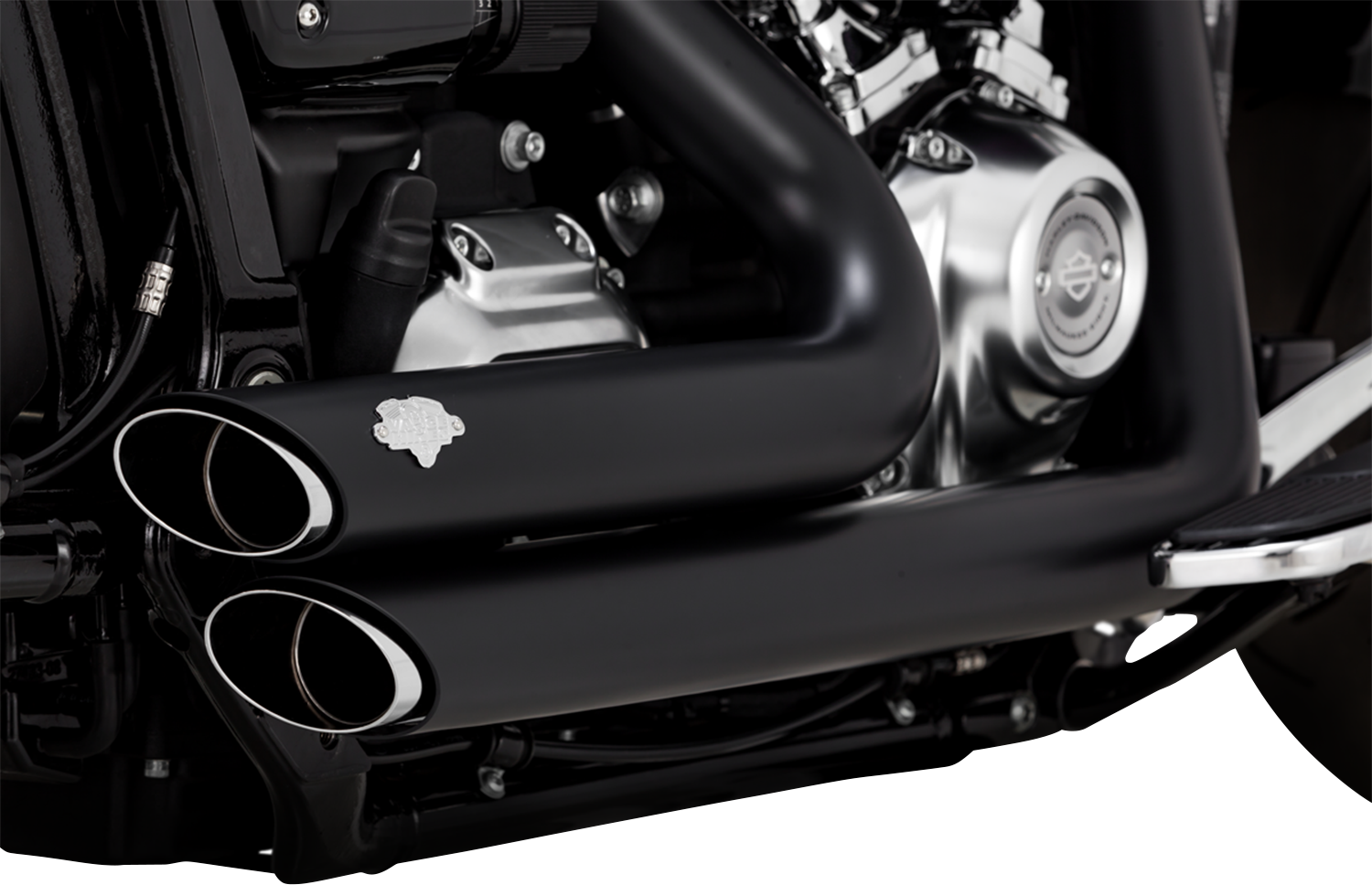 VANCE & HINES Shortshots Staggered Exhaust System in matte black with PCX technology on motorcycle.