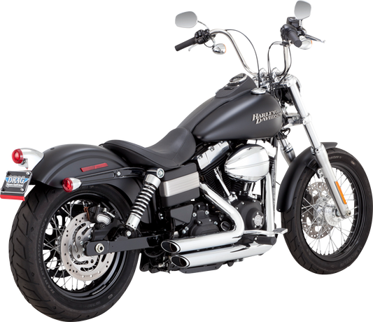 VANCE & HINES Shortshots Staggered exhaust system with chrome finish mounted on a motorcycle engine.
