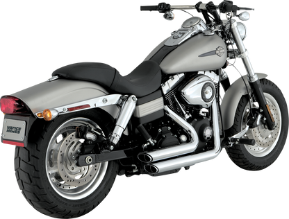 Vance & Hines Shortshots Staggered exhaust system in chrome for motorcycles, featuring dual pipes and chrome finish.