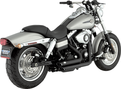 Vance & Hines Shortshots Staggered Exhaust System with PCX Technology in matte black for motorcycle, front and side view.