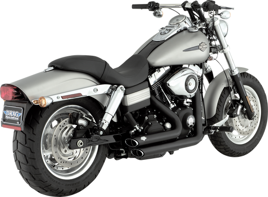 Vance & Hines Shortshots Staggered Exhaust System with PCX Technology in matte black for motorcycle, front and side view.