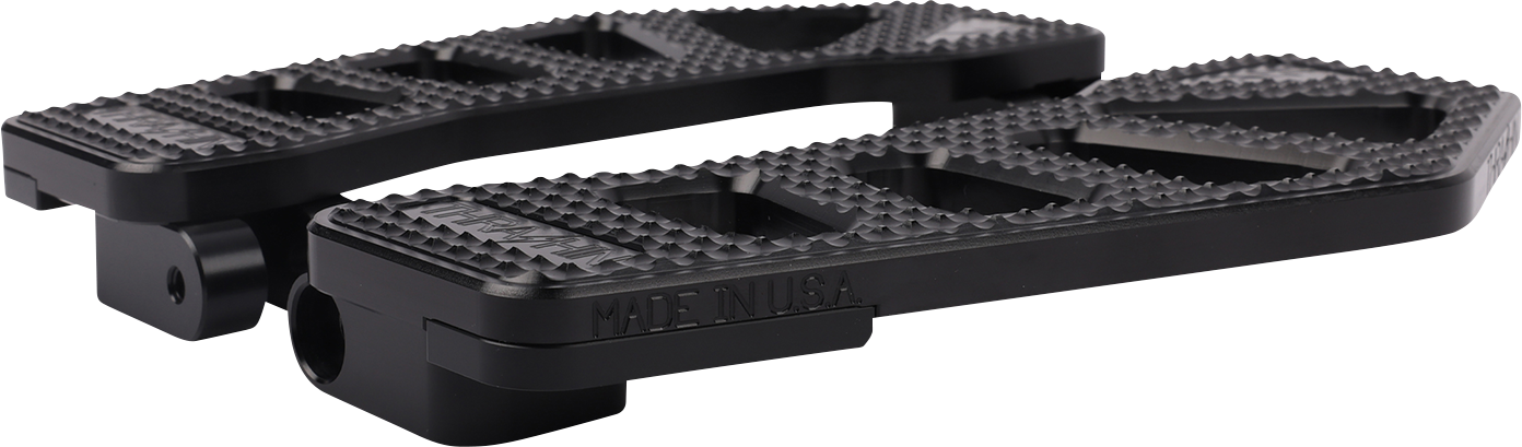Black Apex Floorboards for Harley-Davidson by THRASHIN SUPPLY CO., featuring a textured surface and durable metal construction.
