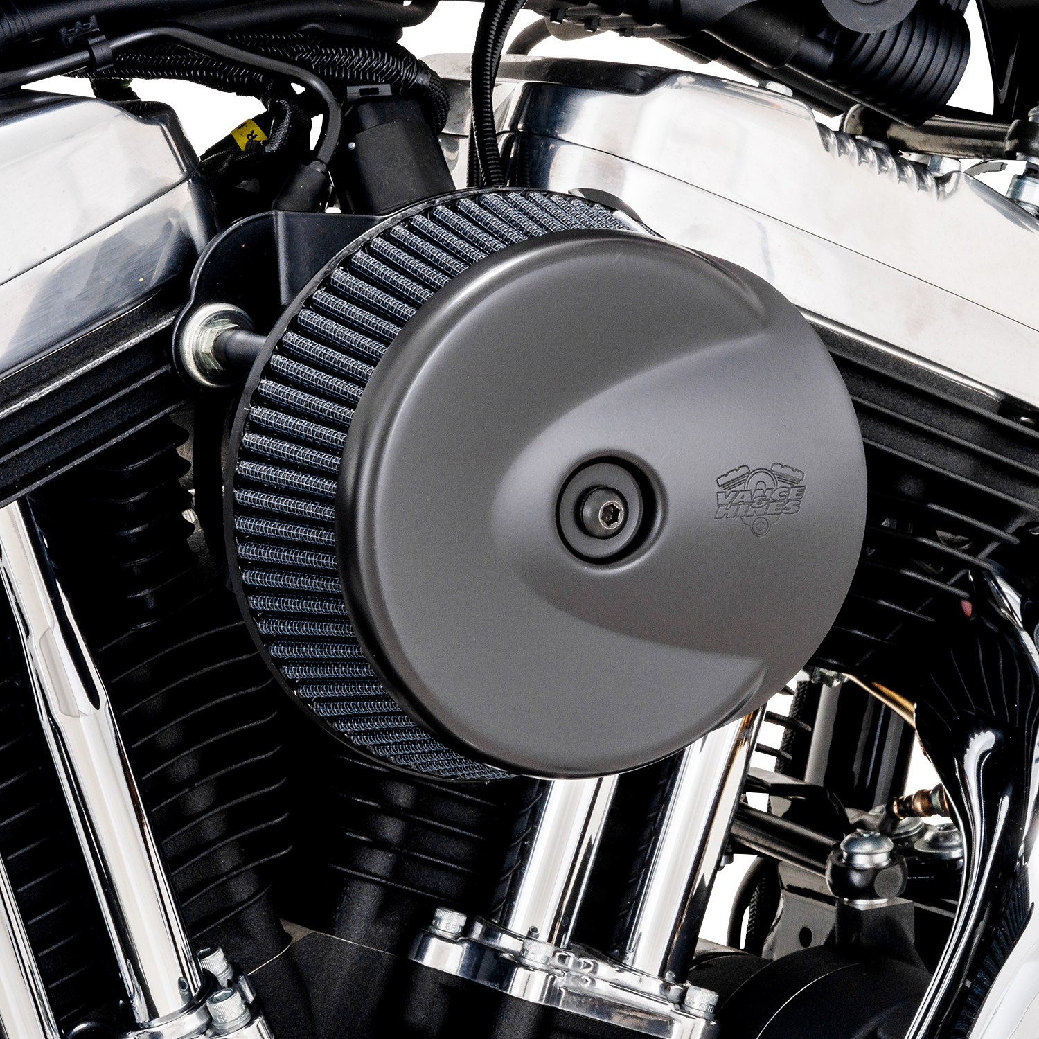 Vance & Hines VO2 Stingray air intake kit in matte black installed on a classic V-twin engine motorcycle.