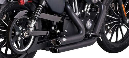 Vance & Hines Shortshots Staggered Black Exhaust System for motorcycle, showcasing sleek black finish and staggered pipe design.