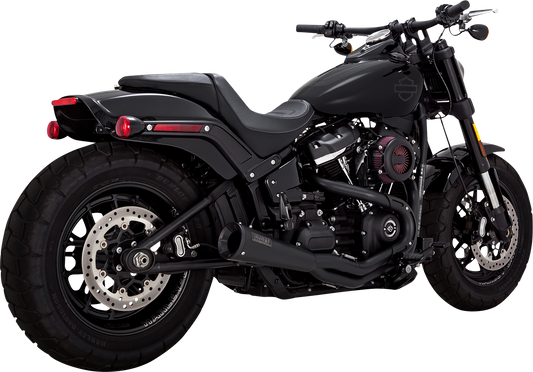 Vance & Hines 47323 2-into-1 Upsweep exhaust system with PCX technology in black stainless steel, mounted on motorcycle.