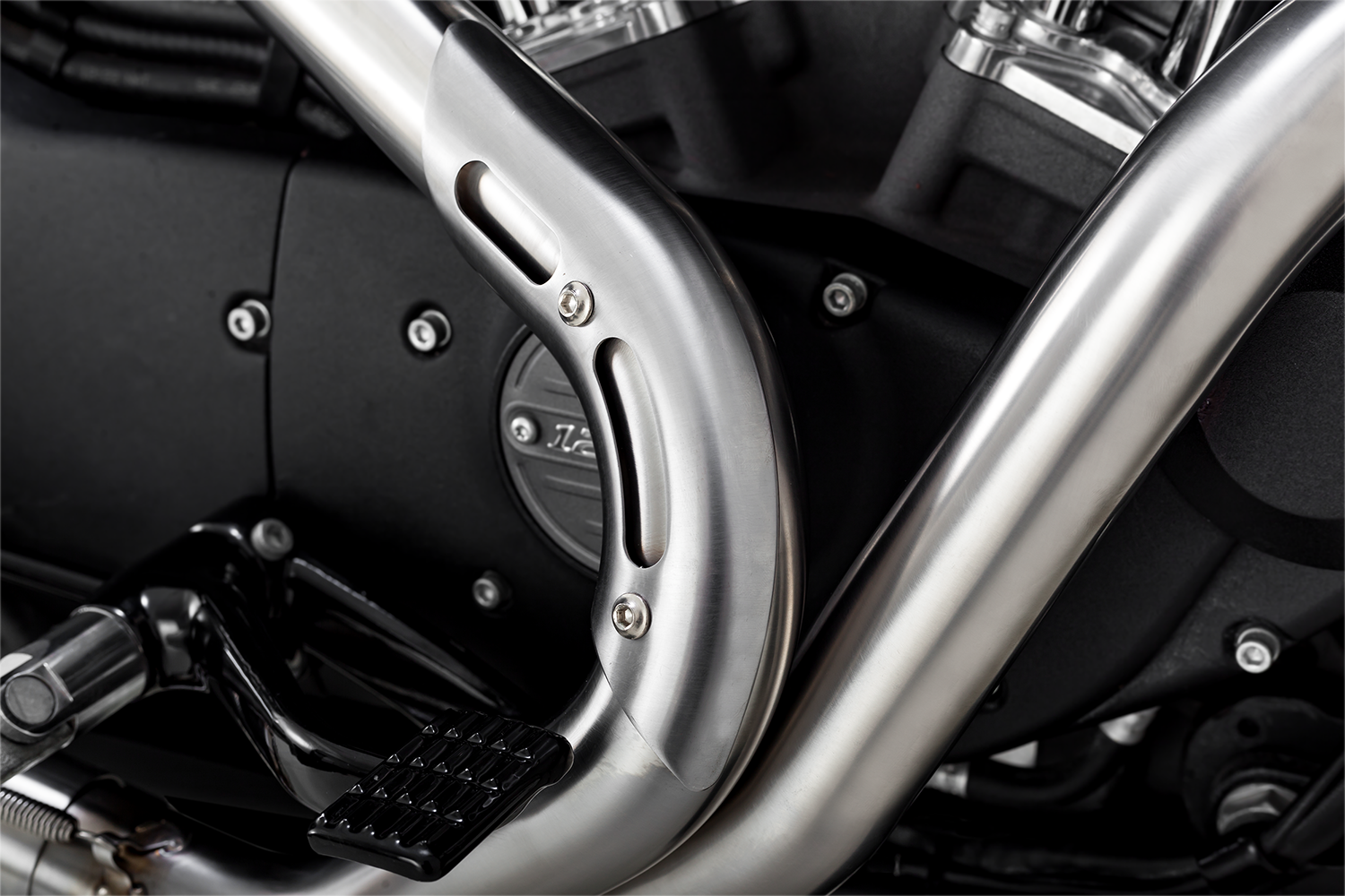 Vance & Hines 27327 2-Into-1 Upsweep exhaust system in brushed stainless steel, showing the sleek, curved motorcycle exhaust pipes.