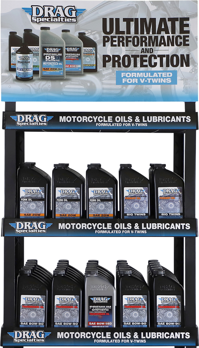 DRAG SPECIALTIES Oil Shelf Display with multiple bottles arranged on a retail shelf, showcasing motorcycle oil products.