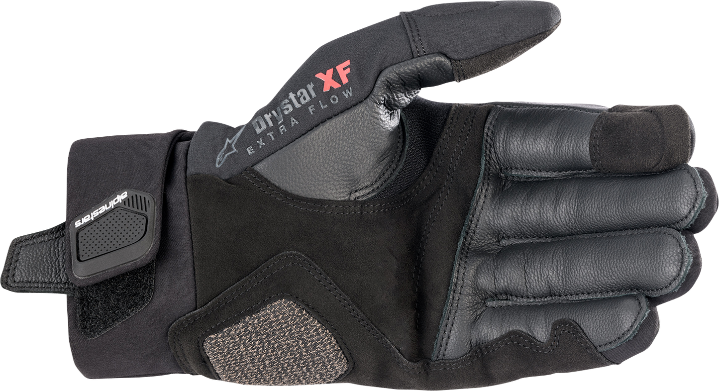 Alpinestars Hyde XT DrystarXF® black motorcycle gloves in XL size, showcasing reinforced knuckles and textured palm design.