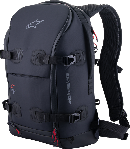 Alpinestars AMP-7 backpack in black with multiple compartments, adjustable straps, and branding visible on the front.