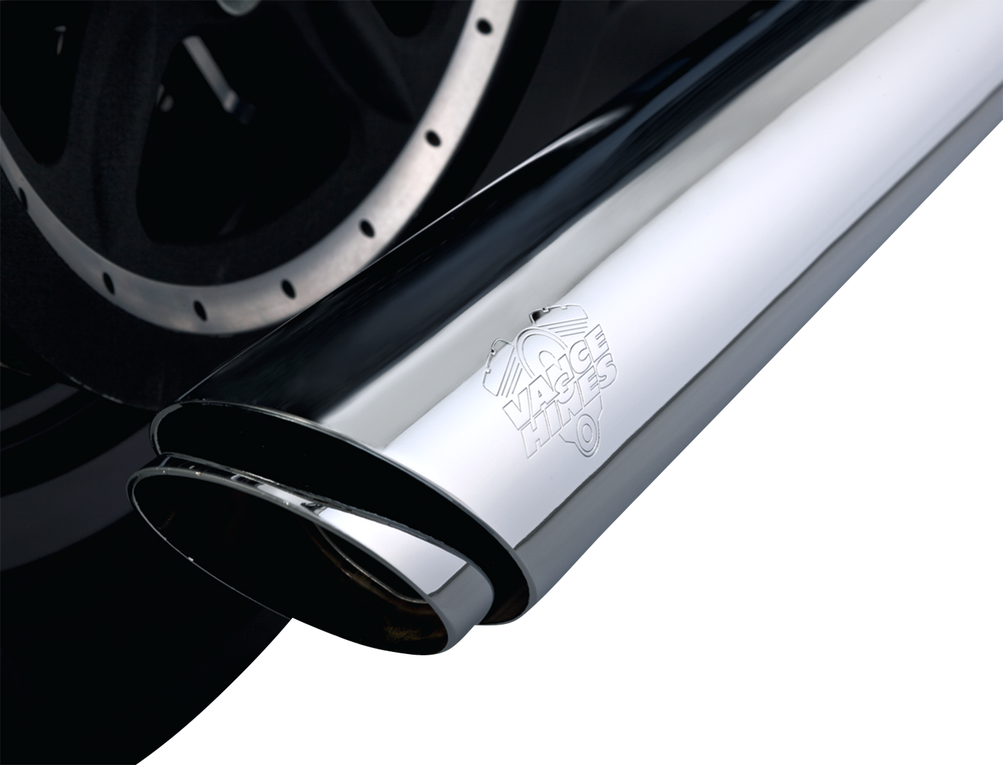 Chrome Vance & Hines 3-inch Twin Slash Slip-On muffler for motorcycle, featuring a sleek, polished exhaust design.