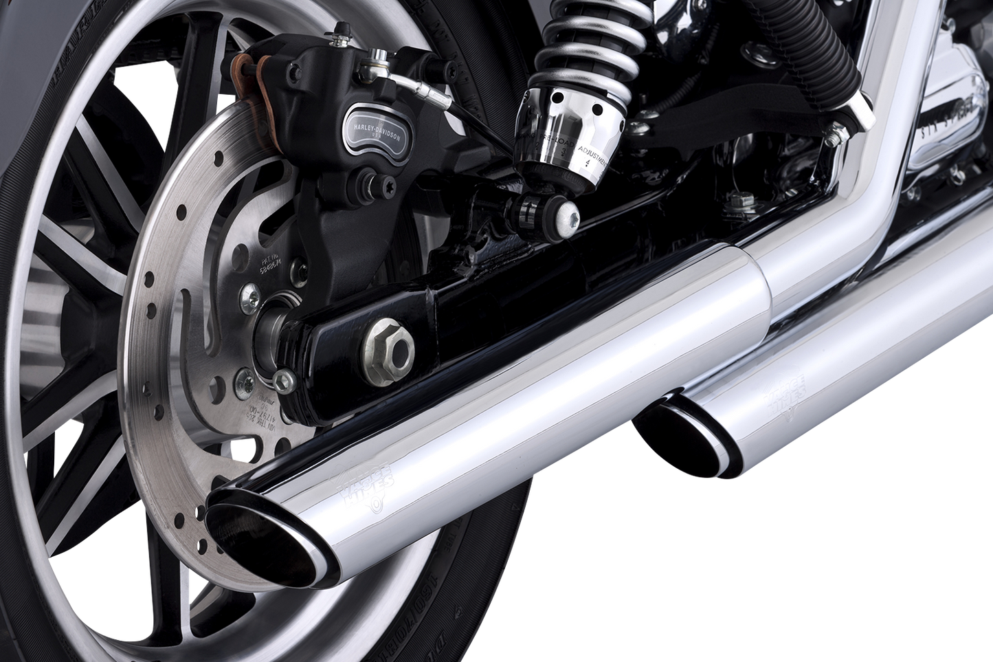 Chrome Vance & Hines 16337 3-Inch Twin Slash Slip-On Muffler for motorcycle exhaust system.