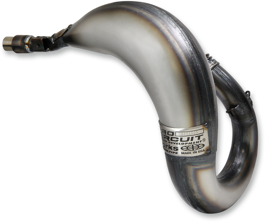 High-performance PRO CIRCUIT Works Pipe motorcycle exhaust system with bare metal finish, designed for enhanced bike performance.