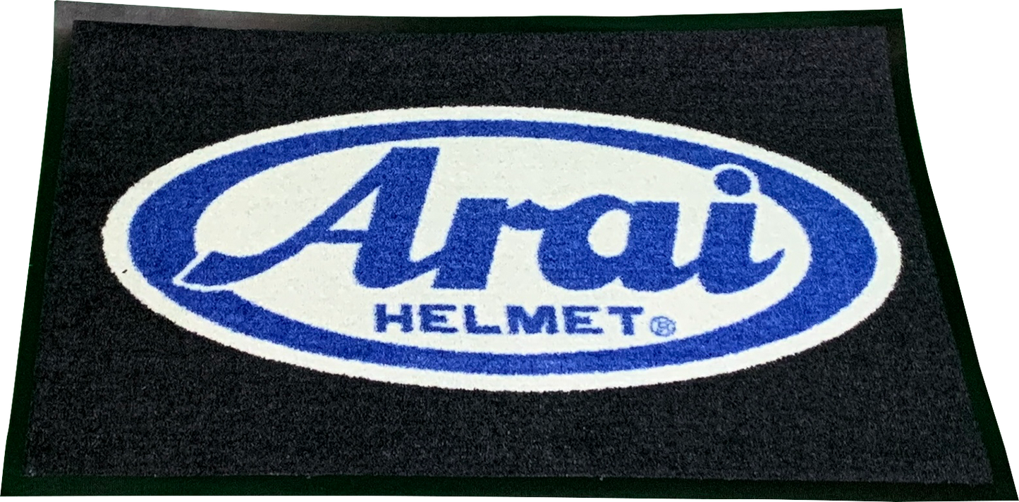 Large Arai Helmets logo rug featuring two-tone design and Arai logo accent, ideal for motorcycle helmet enthusiasts.
