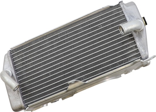 Moose Offroad OEM replacement radiator for Honda vehicles, part number 19010865, showing the radiator with cooling fins and inlet outlets.