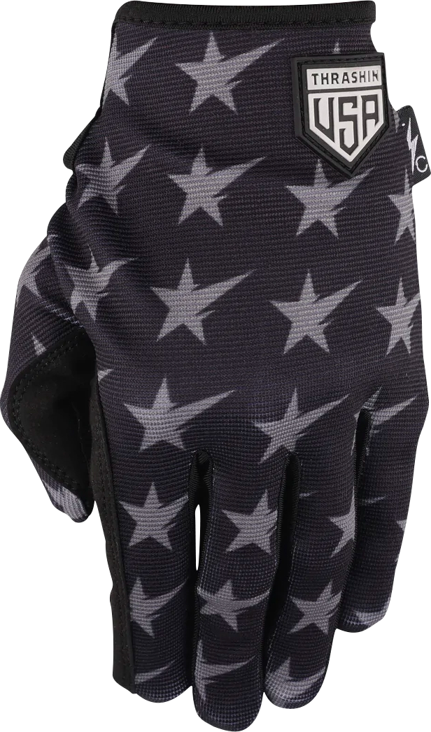 Black and gray Stealth gloves by THRASHIN SUPPLY CO. featuring stars and bolts design, large size, built for comfort and durability.