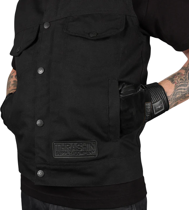 Black THRASHIN SUPPLY CO. Nightrider v2 riding vest in size XL, featuring durable design and reflective details for motorcycle riding.
