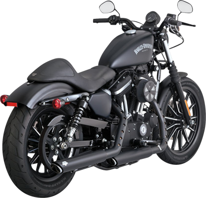 VANCE & HINES 3-inch twin slash slip-on mufflers with PCX technology in black for motorcycle exhaust upgrade.