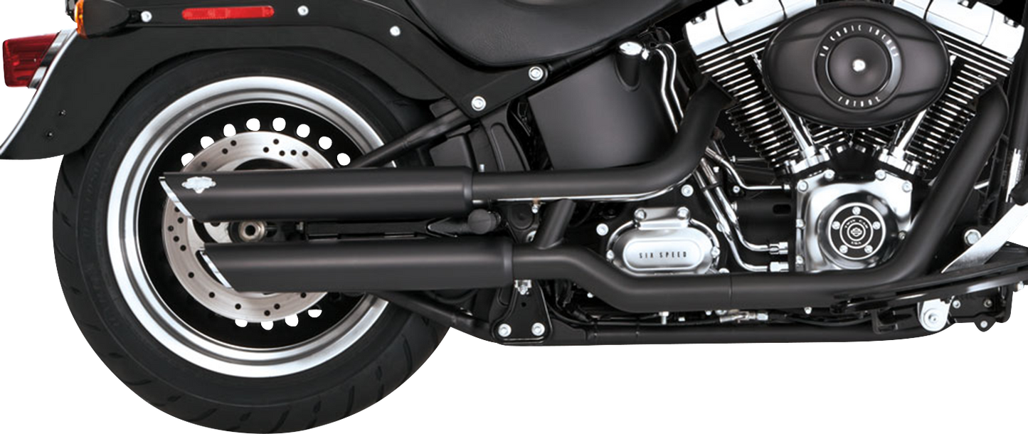 Black Vance & Hines 3-inch Twin Slash Slip-On Mufflers with PCX Technology, designed for motorcycle exhaust systems.