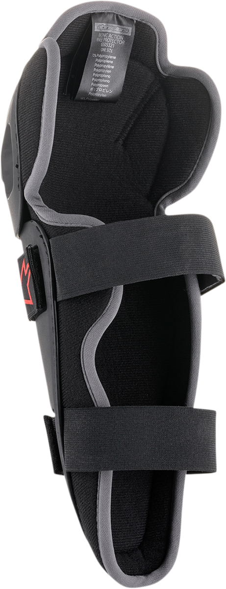 Alpinestars Bionic Action knee guards in black, protective gear for motocross and off-road riding, featuring adjustable straps.