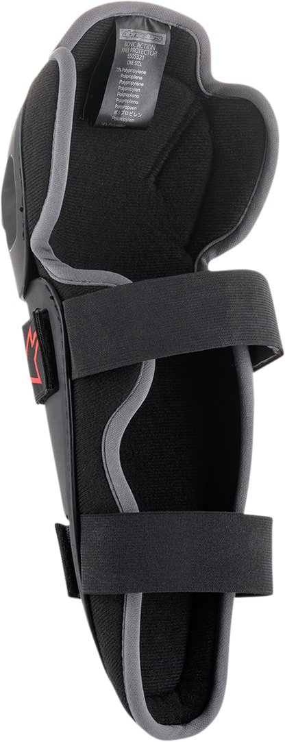 Alpinestars Bionic Action knee guards in black, protective gear for motocross and off-road riding, featuring adjustable straps.