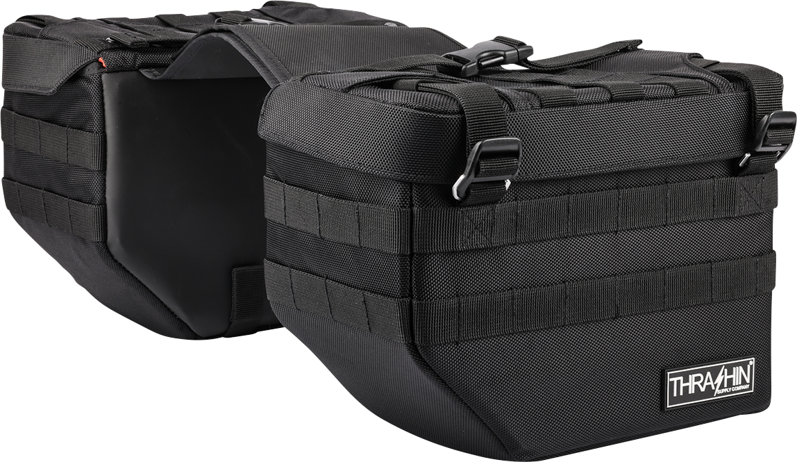 Black motorcycle expedition saddlebags from THRASHIN SUPPLY CO., designed for durable storage on touring bikes.