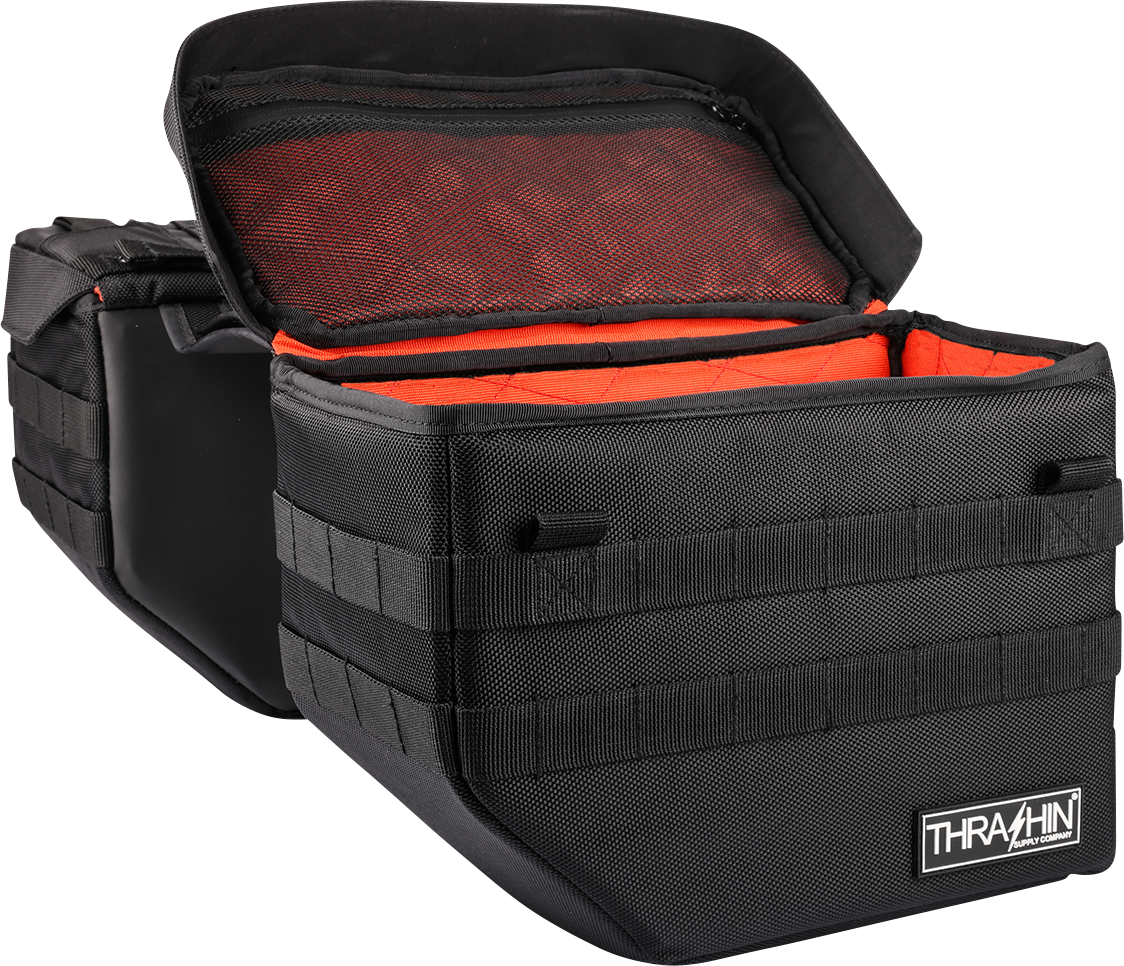 Black Thrasin Supply Co. Expedition Saddlebags for motorcycles, featuring durable storage with secure straps and rugged design.