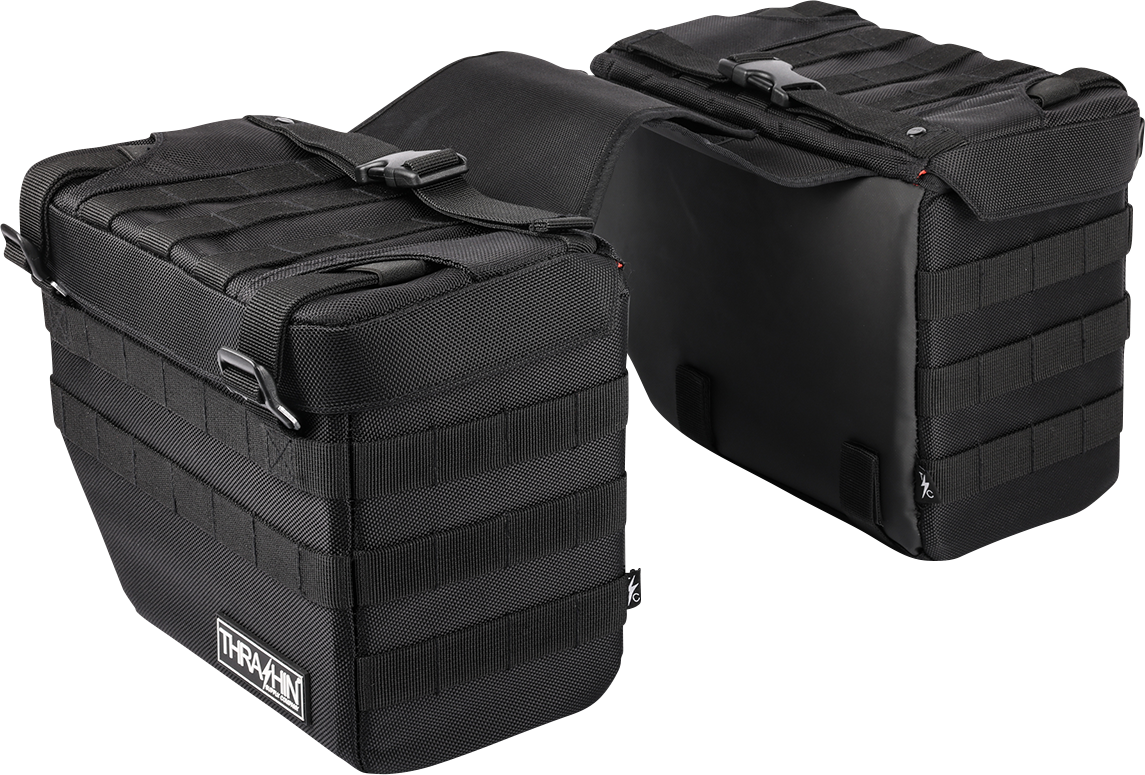 Black THRASHIN SUPPLY CO. Expedition Saddlebags mounted on motorcycle for secure storage.
