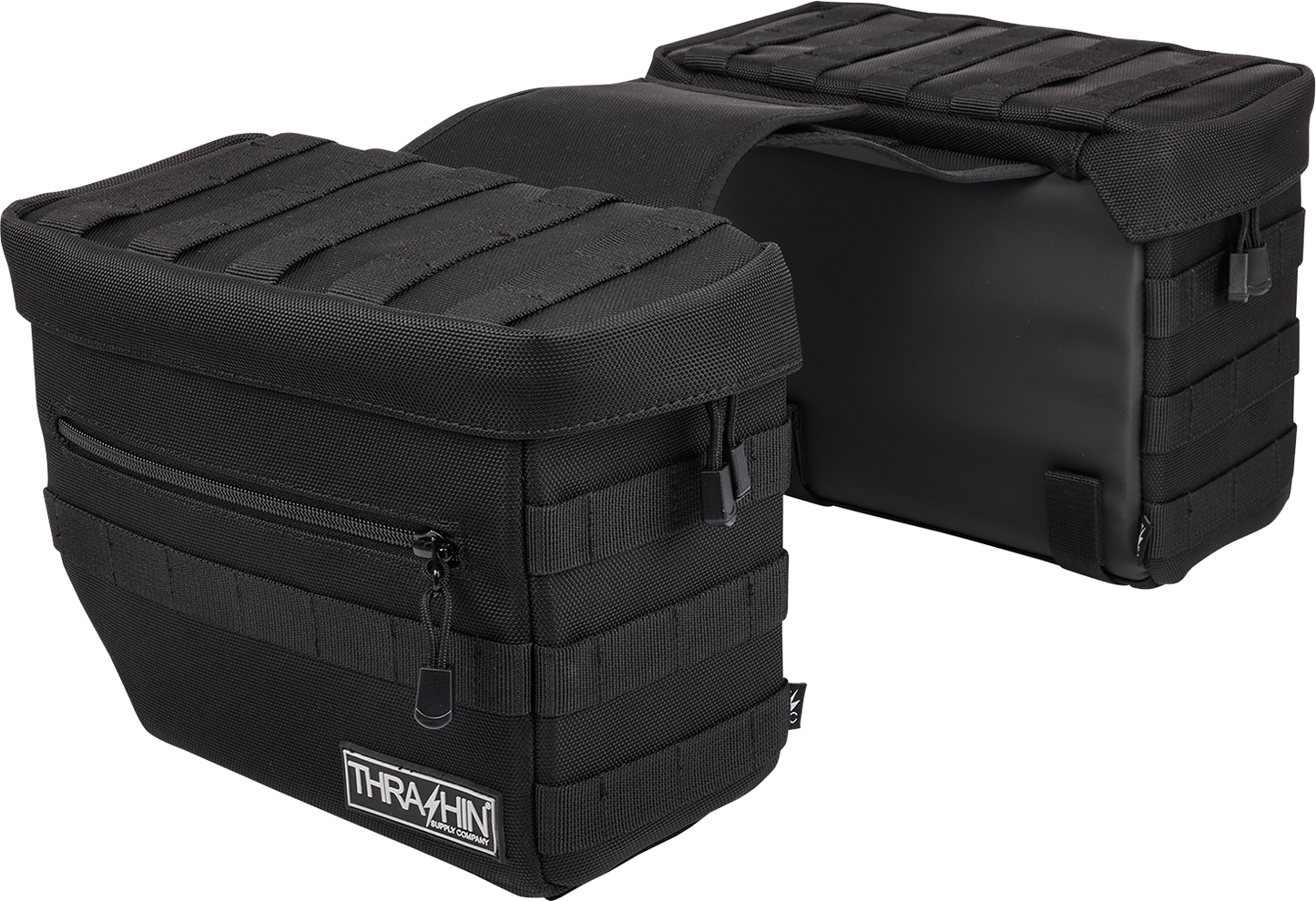 Black THRASHIN SUPPLY CO. Essential Saddlebags with 10-liter capacity, mounted on motorcycle, durable storage solution