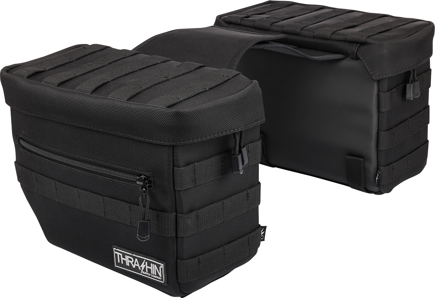 Black THRASHIN SUPPLY CO. Essential Saddlebags with 10-liter capacity, mounted on motorcycle, durable storage solution