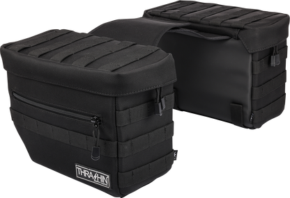 Black THRASHIN SUPPLY CO. Essential Saddlebags with 10-liter capacity, mounted on motorcycle, durable storage solution