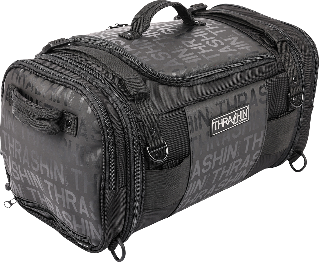 THRASHIN SUPPLY CO. motorcycle passenger bag with 32L capacity, versatile mounting options, shown mounted on a motorcycle seat