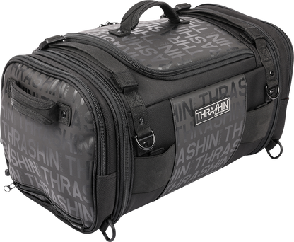 THRASHIN SUPPLY CO. motorcycle passenger bag with 32L capacity, versatile mounting options, shown mounted on a motorcycle seat