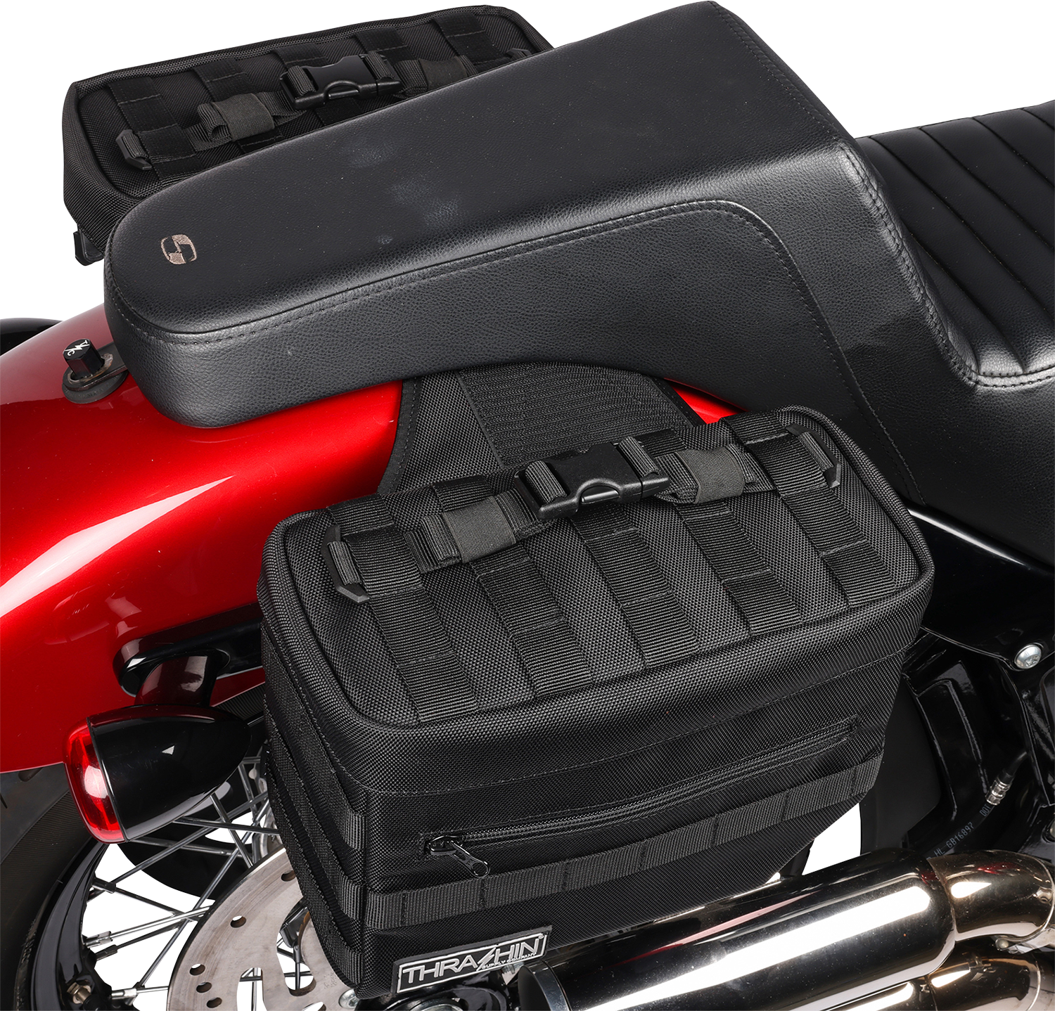 Black THRASHIN SUPPLY CO. Essential Saddlebags with 10-liter capacity, designed for motorcycle storage and durability.