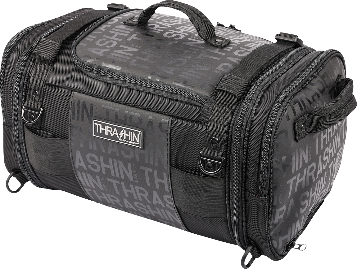 THRASHIN SUPPLY CO. motorcycle passenger bag with 32L capacity, versatile mounting options, shown mounted on a motorcycle seat.