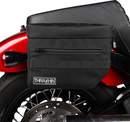Black THRASHIN SUPPLY CO. Essential Saddlebags with 10-liter capacity, designed for motorcycle storage and durability.
