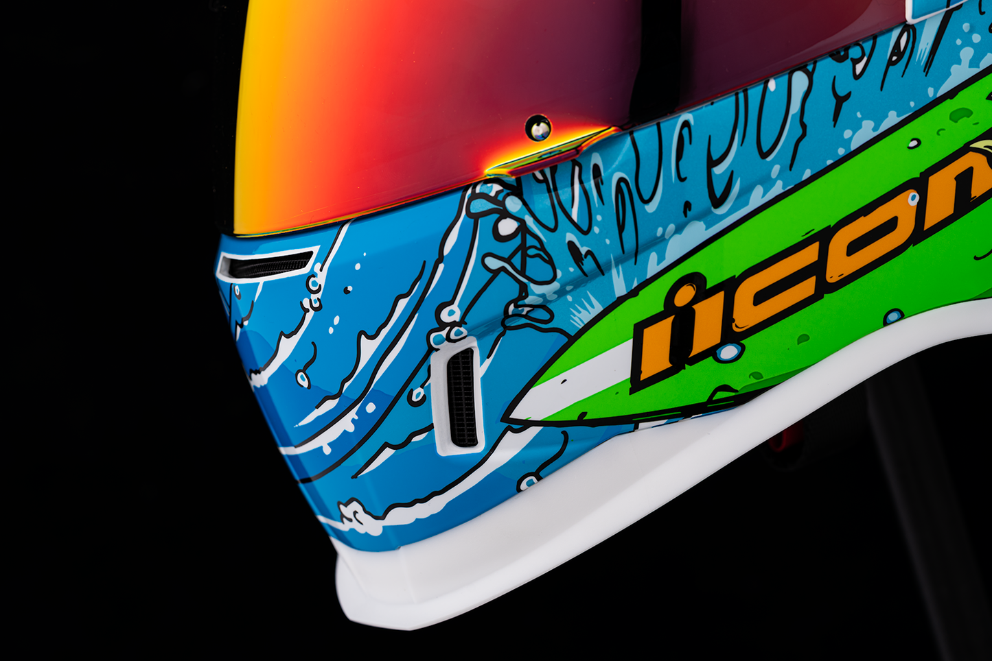 ICON Airform™ Dino Fury helmet for large size, black and red motorcycle helmet with aerodynamic design.