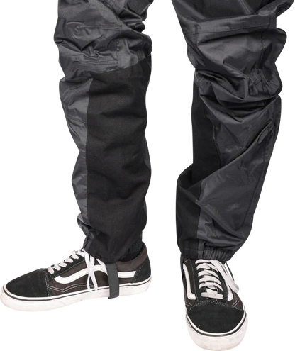 Black THRASHIN SUPPLY CO. Mission Rain Pants in size S/M, featuring waterproof fabric and adjustable waistband.