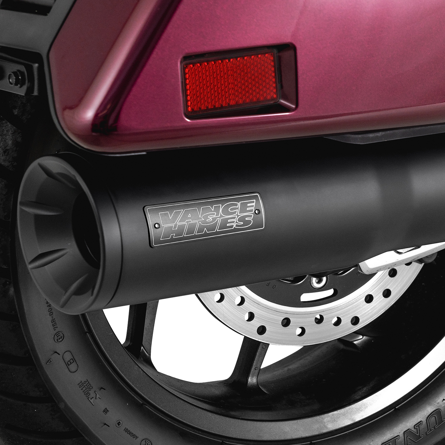 VANCE & HINES Hi-Output Slip-On Muffler in matte black with CNC aluminum finish for motorcycle exhaust upgrade.